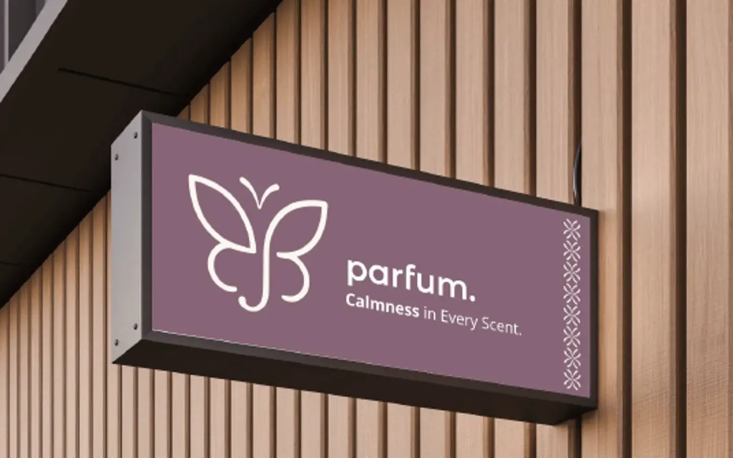 Jiea Parfum shop sign with the butterfly logo, parfum wordmark and Calmness in Every Scent. line
